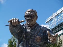 On the North Side of Chicago, there is a statue of Harry Caray, and on the south side there is an owner who refers to Harry and "scum."