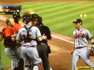 Chris Johnson (left) ran straight down the third baseline, then took a hard right to keep the umpire between him and a potential left cross from Jose Fernandez.
