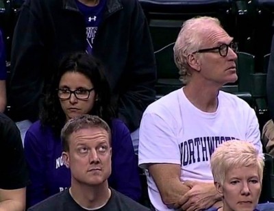 Julia Louis-Dreyfus (with husband Brad Hall) cheered like a normal basketball mom yesterday as her son's Northwestern team lost to Michigan in OT.
